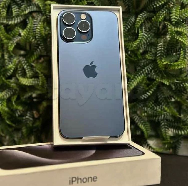 15 pro max 512G occasion état neuf