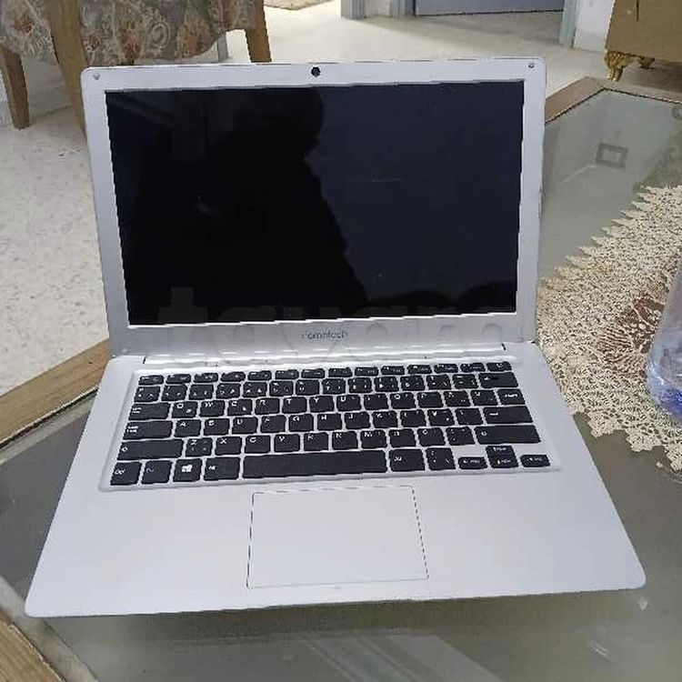 pc notebook slim a echange avec telephone portable