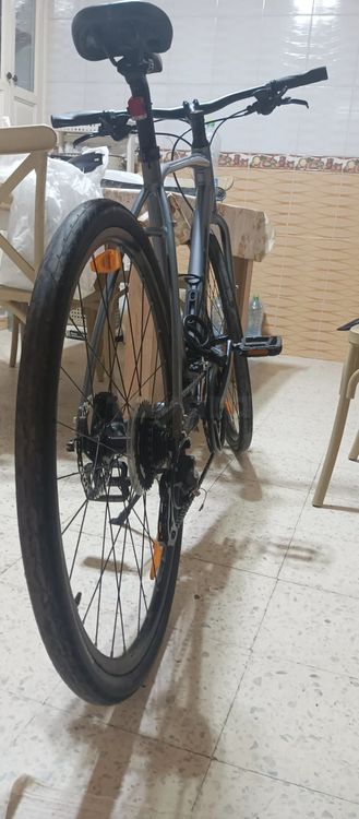 Vtc giant escape 2 neuf avec garde boue et porte bagage