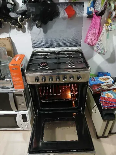 cuisinière ELECTROLUX 4 feux importé Four électrique avec ventilateur