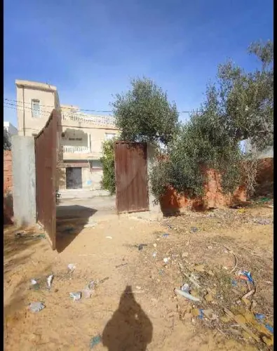 a vendre a sousse chat mariem un lot de terrain clôturer côté Mer de 437m2