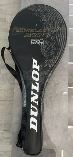Tennis Raquette Dunlop Professionelle  en très bon état