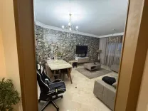 a vendre un appartement S2 avec place parking a la المدينة الجديدة