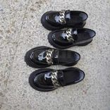 Deux Chaussures d'enfants