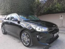 KIA RIO PRESTIGE PREMIÈRE MAIN EN ÉTAT NEUF BOÎTE MANUELLE